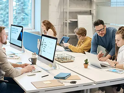 Future architects and engineers working together on digital building models during a Revit BIM internship in Ahmedabad